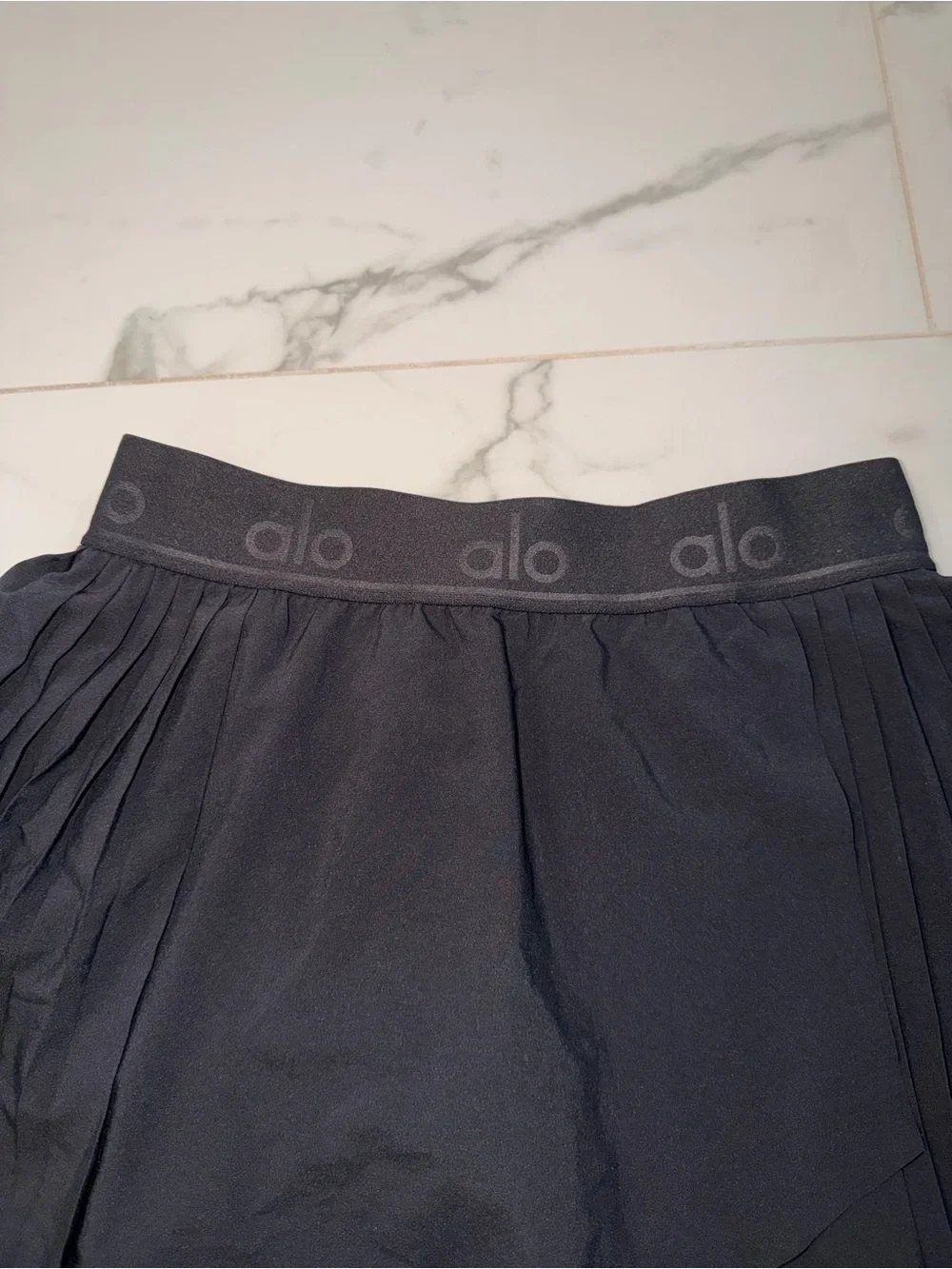 ALO Yoga Black Pleated Skater Skirt with Elastic Logo Waistband
